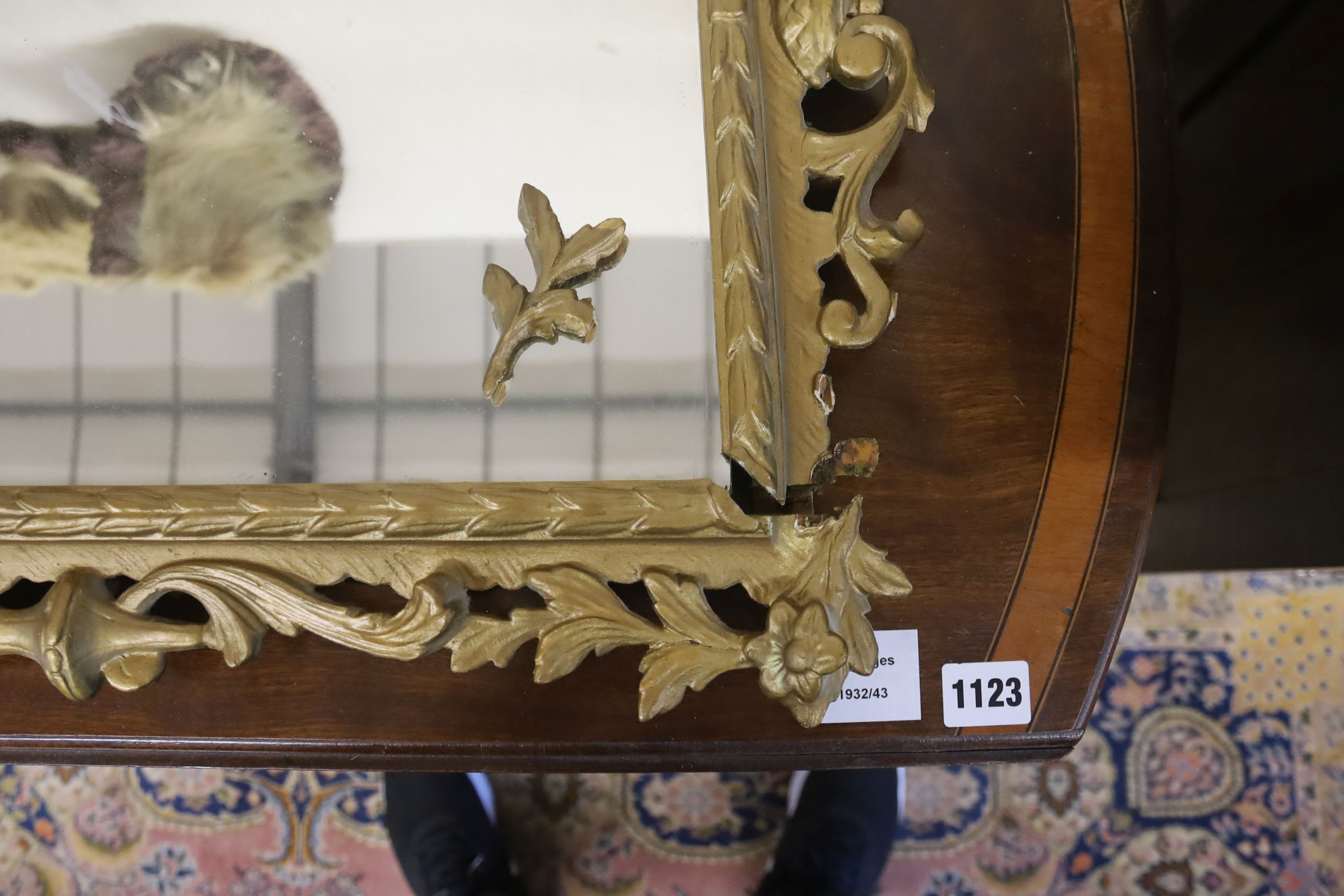 A Victorian style rectangular pierced gilt wood and gesso framed wall mirror, width 48cm, height 54cm